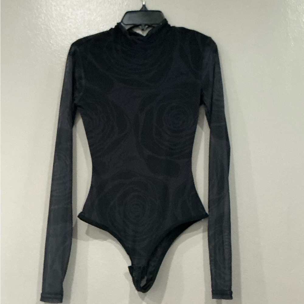 NWT Women’s Selena Quintanilla Official Mesh Bodysuit
Black Roses Long Sleeve.